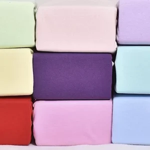 Простирадла на резинці трикотаж